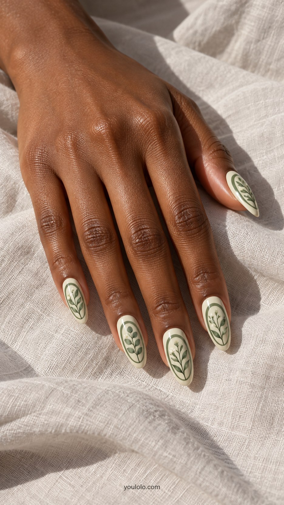 Sage Botanical Cameos: medium almond ivory nails, oval sage botanical painted panels with thin green border, flat surface