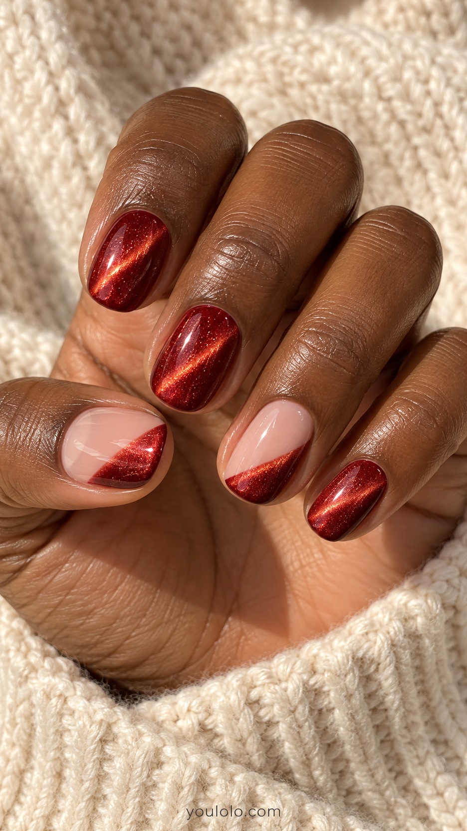 Short Red Cat Eye Nails: short rounded scarlet magnetic corner on nude thumb and ring, remaining scarlet magnetic full color
