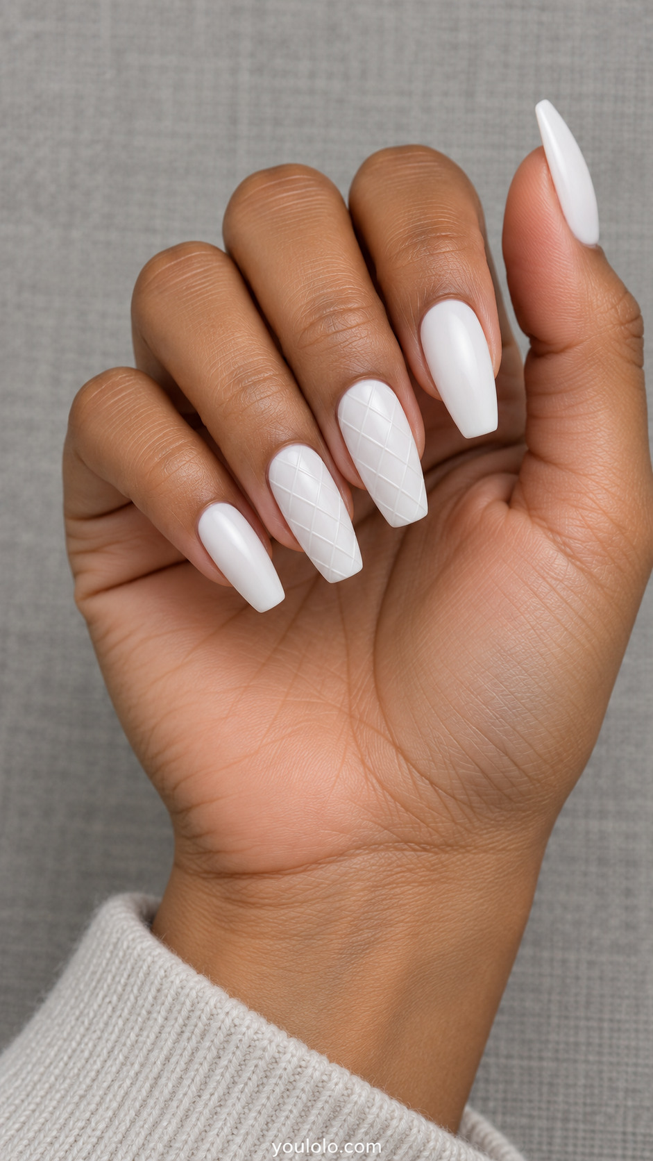 Satin-white coffin nails with fine raised quilt lines on two accent nails