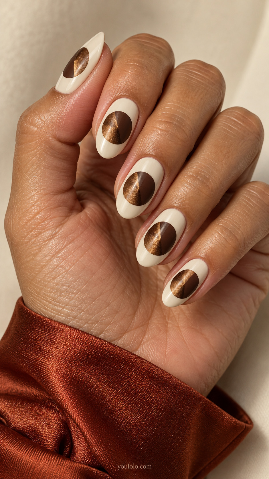 Split-Tone Magnetic Circles manicure on medium oval.