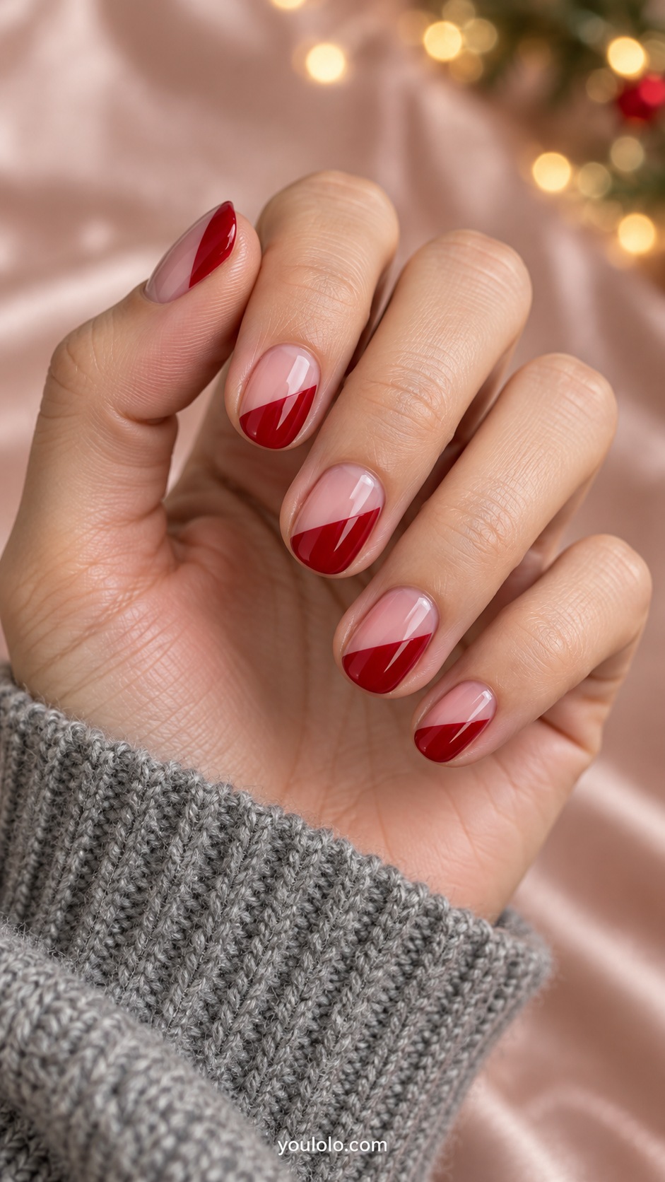 Short round sheer pink nails lower diagonal tip half glossy cherry red with simple straight boundary