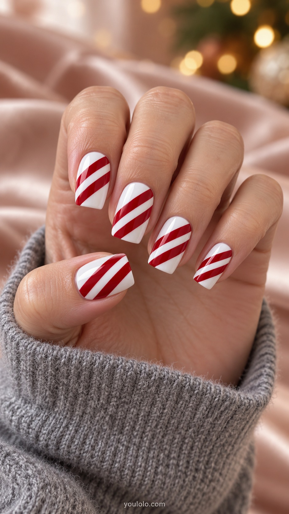Medium square opaque white nails two broad diagonal red bands each nail