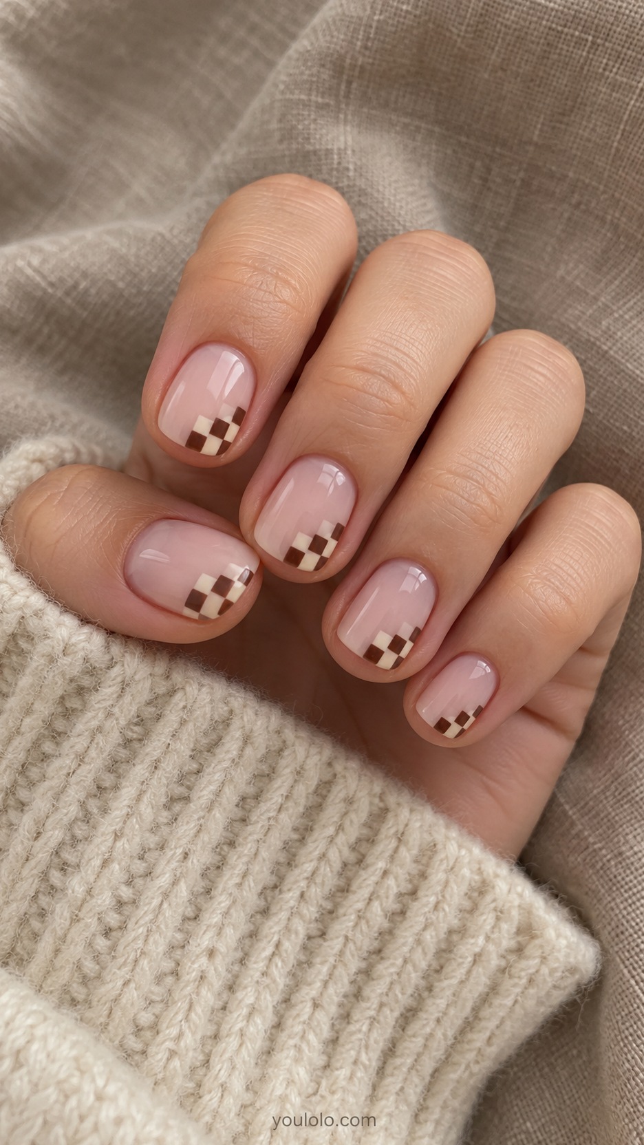 Short Artsy Nails: Soft Checker Fragments manicure on a naturally posed hand