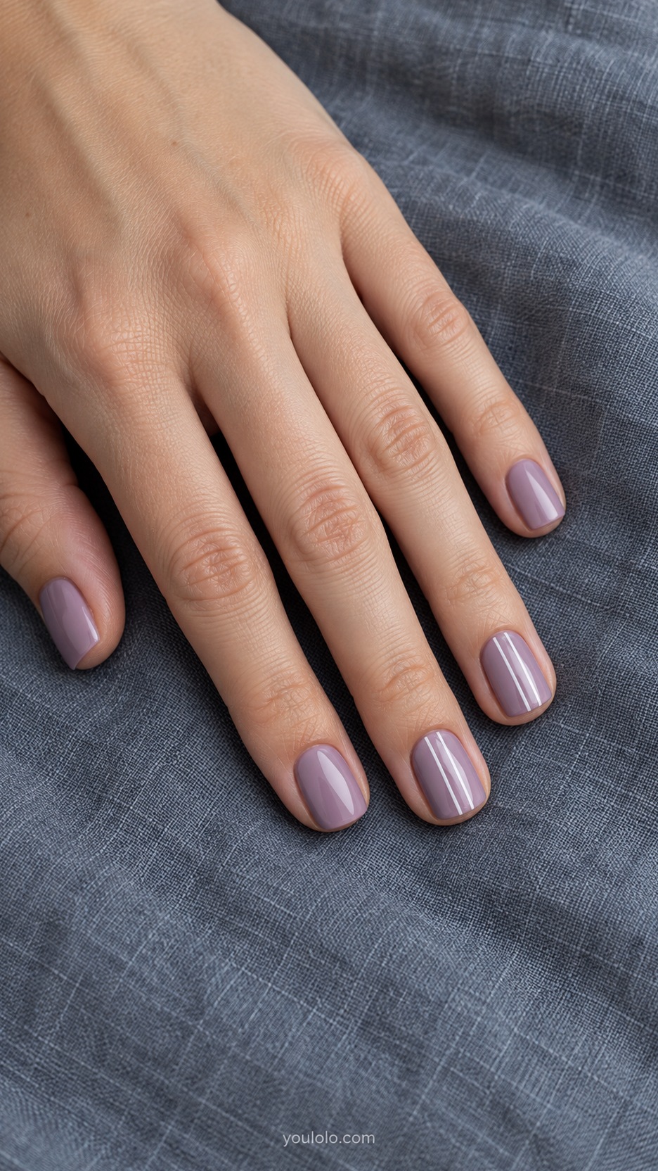 Short Square Nail Designs: Lilac Pinstripes manicure on a naturally posed hand