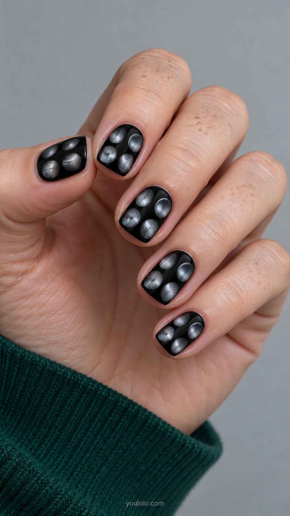 Black Satin and Magnetic Silver Spots manicure on short soft-square nails.