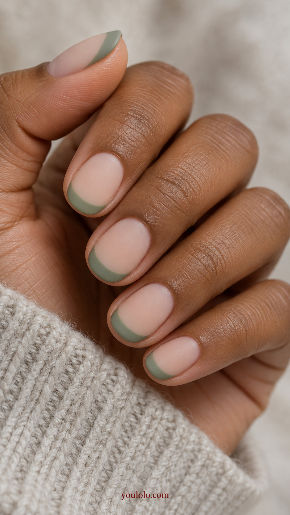 Matte Sage French on a Sheer Base on a softly gathered feminine hand with a matte green manicure
