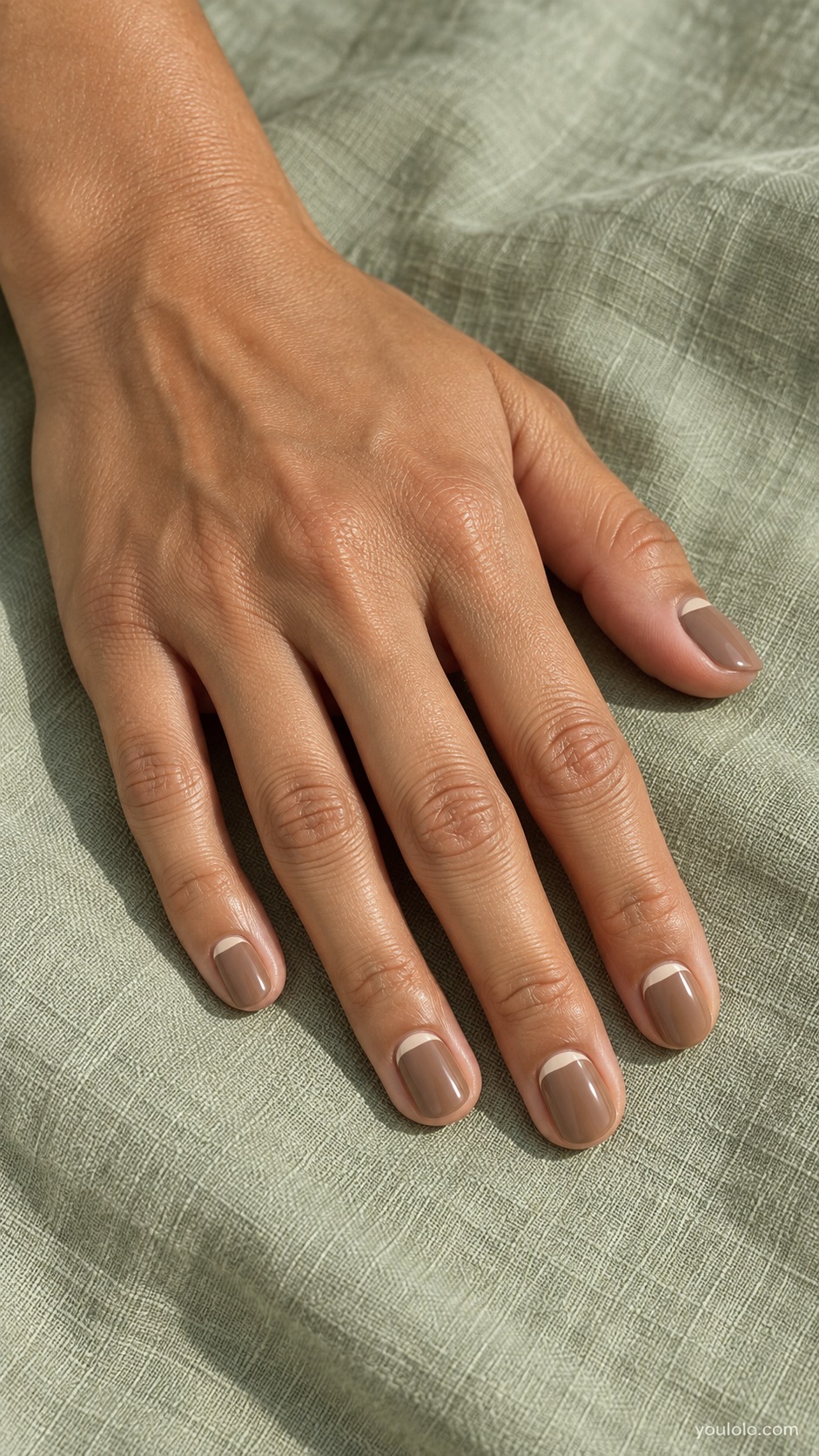 Oat Milk Cuticle Arc — short round warm light brown cream nails delicate oat ivory painted arc at base of each nail