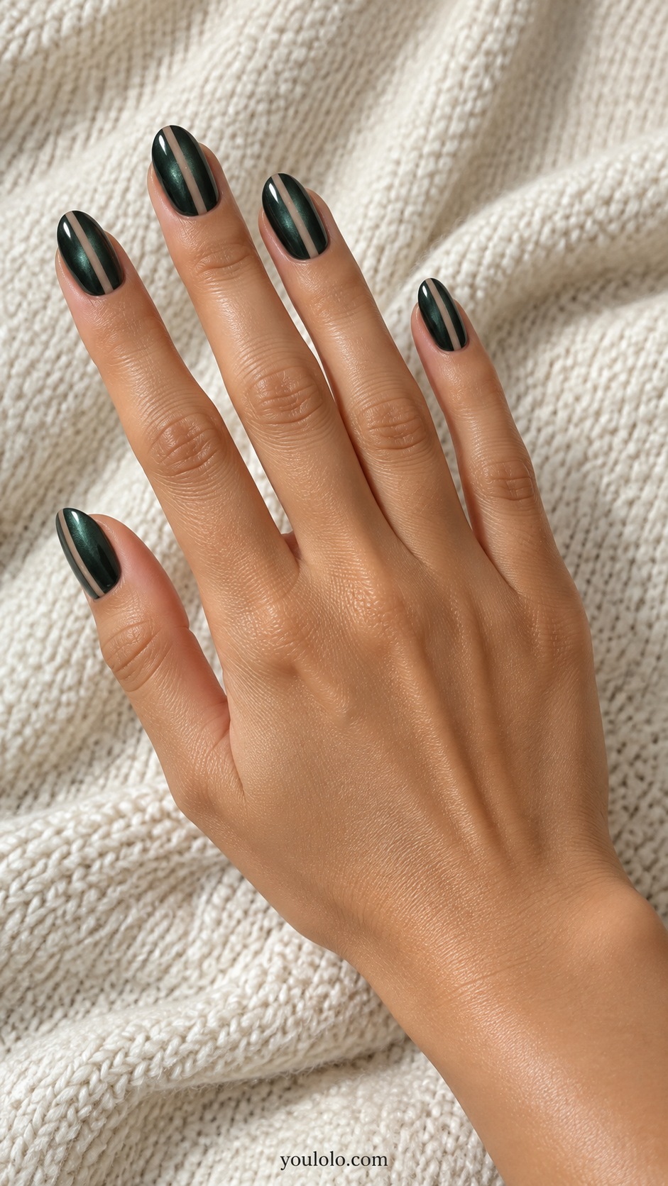Medium oval dark pine pearl nails narrow sheer neutral vertical negative space stripe slightly off-center