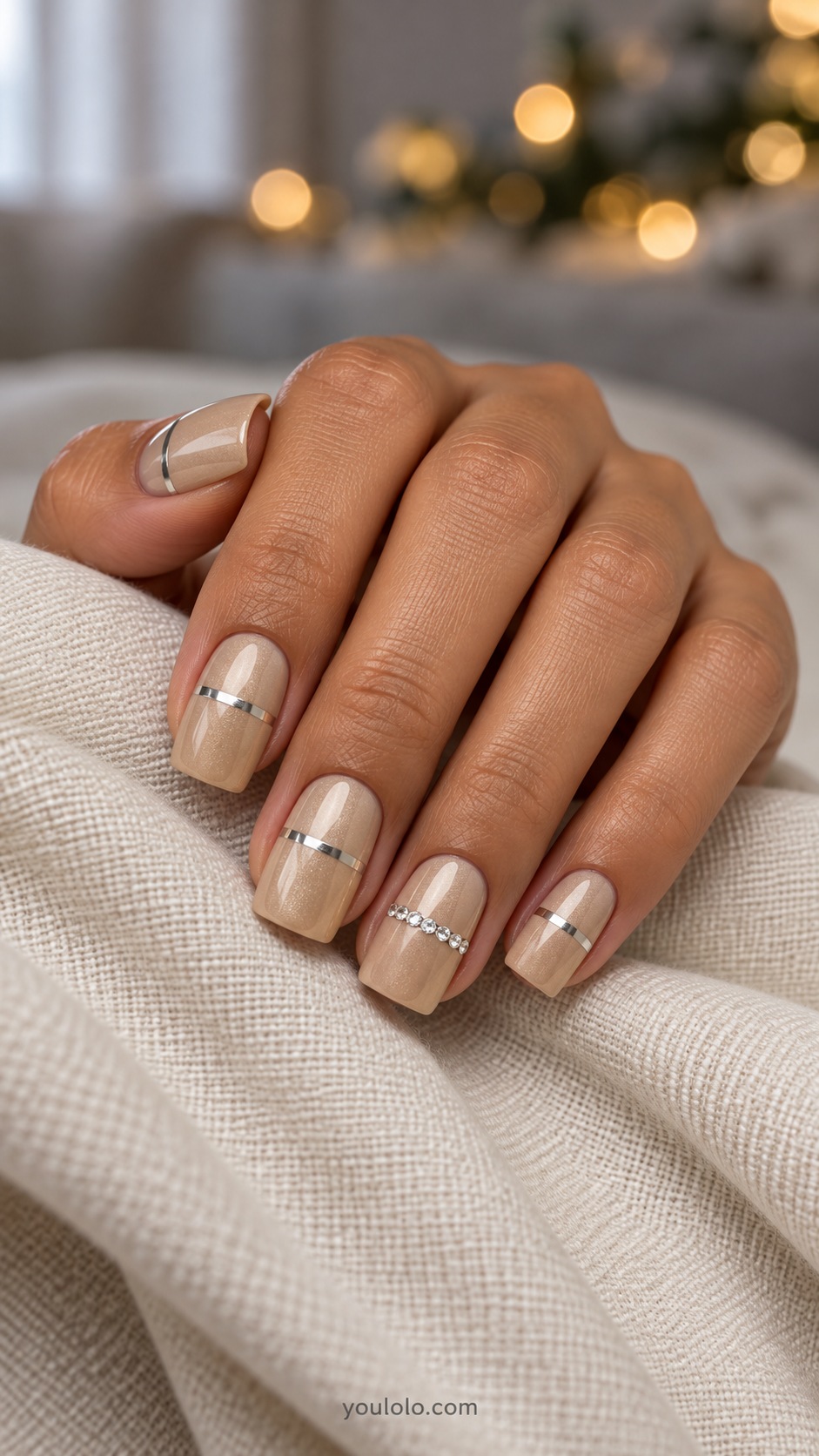 Medium square champagne beige nails ring nail one row of tiny clear crystals across middle other nails single silver painted band