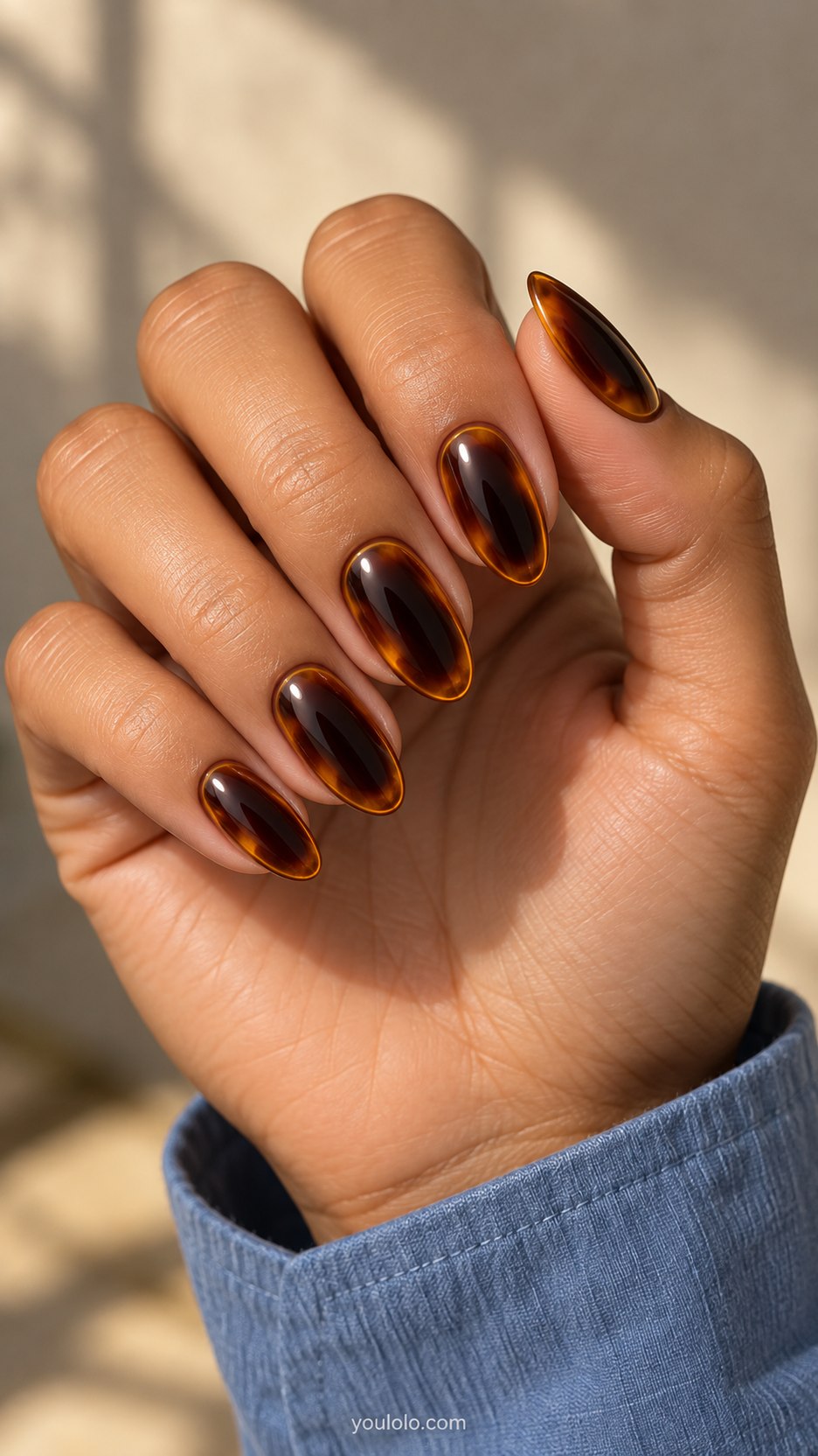 Concave Amber Windows: medium almond amber nails, flat painted dark-centered oval with edge highlights creating inset illusion