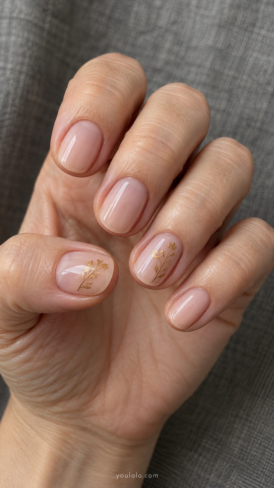 Short Wedding Nails: Golden Wildflowers manicure on a naturally posed hand
