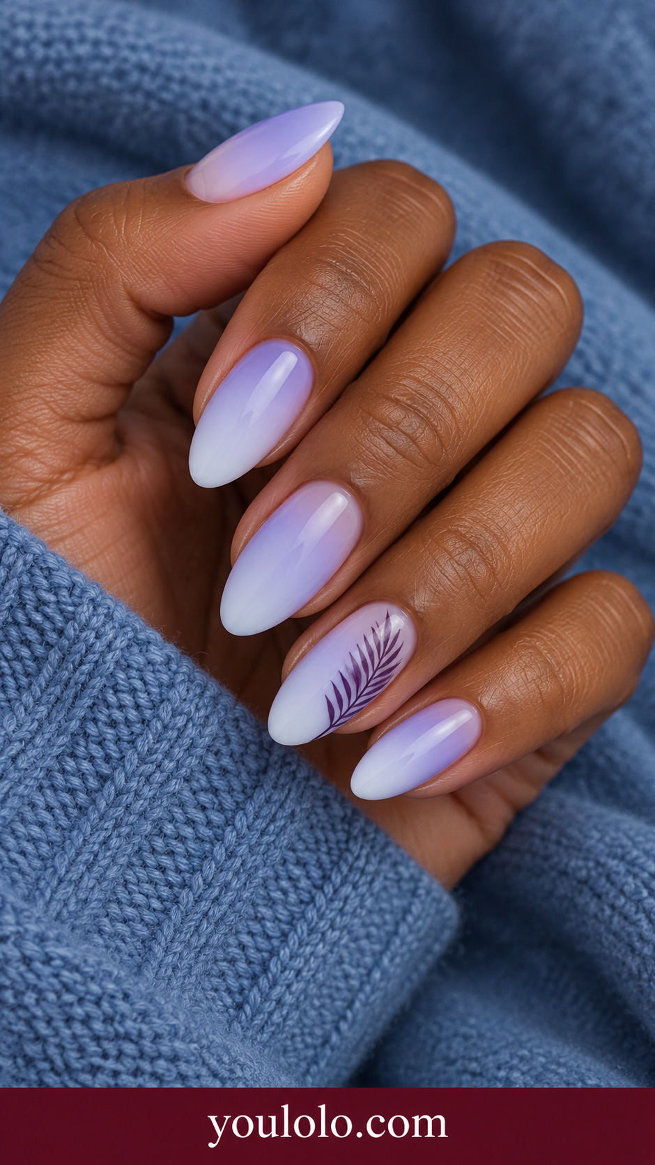 Tropical Purple Palm: medium almond milky lilac nails one accent fine dark purple single palm frond outline confined to one side on a naturally posed adult hand