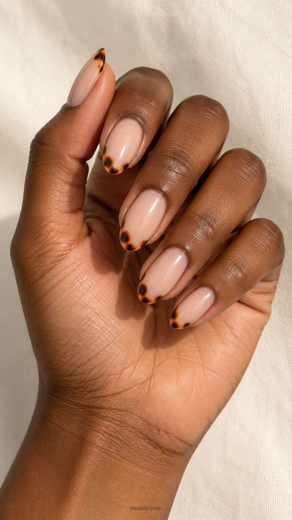 Caramel Tortoise Corners — medium almond nude beige nails small translucent amber tortoise patches only at outer tip corners