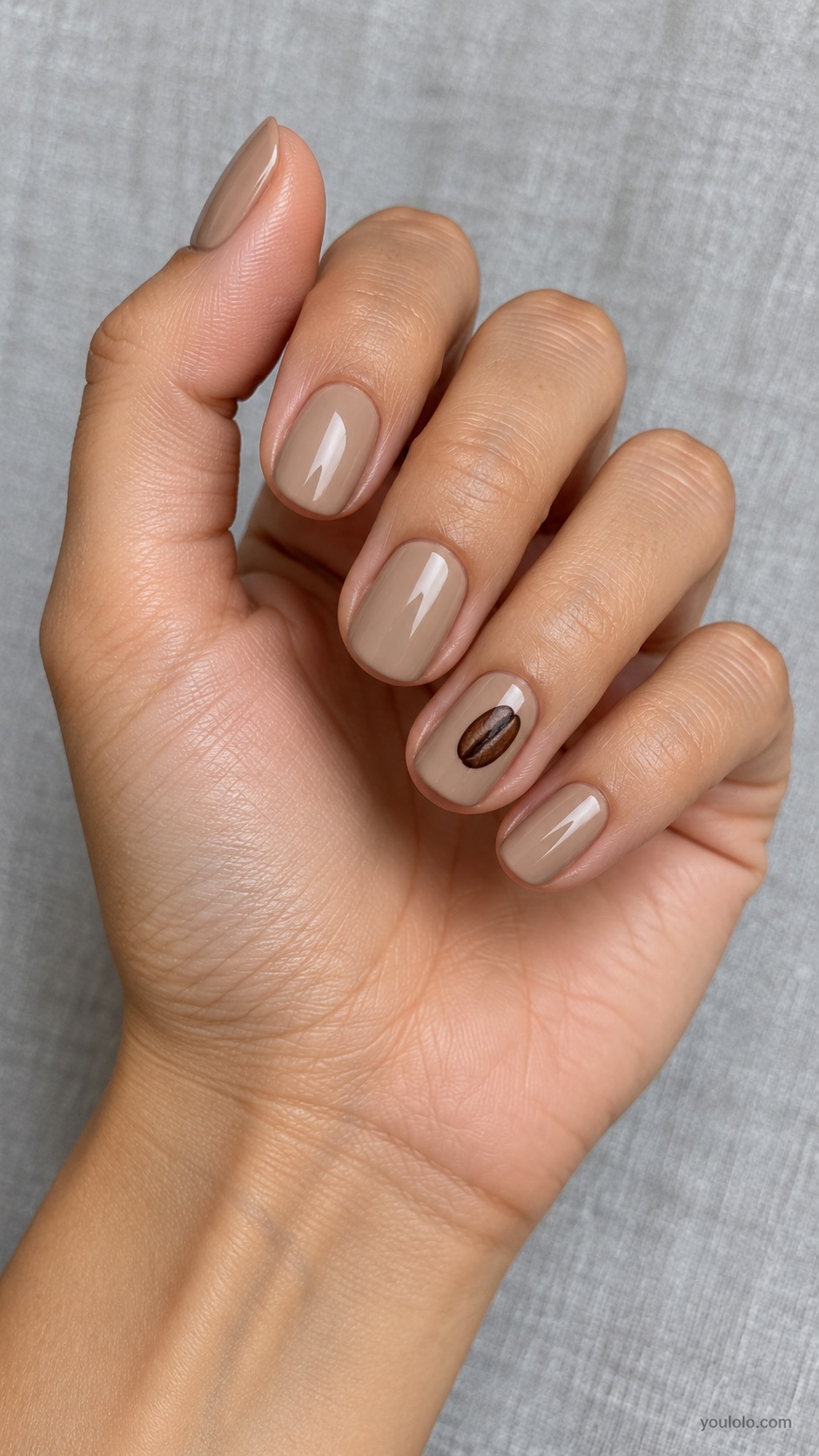 Coffee Bean Tiny Motif — short oval cappuccino cream nails one ring nail one small dark brown coffee bean painted motif
