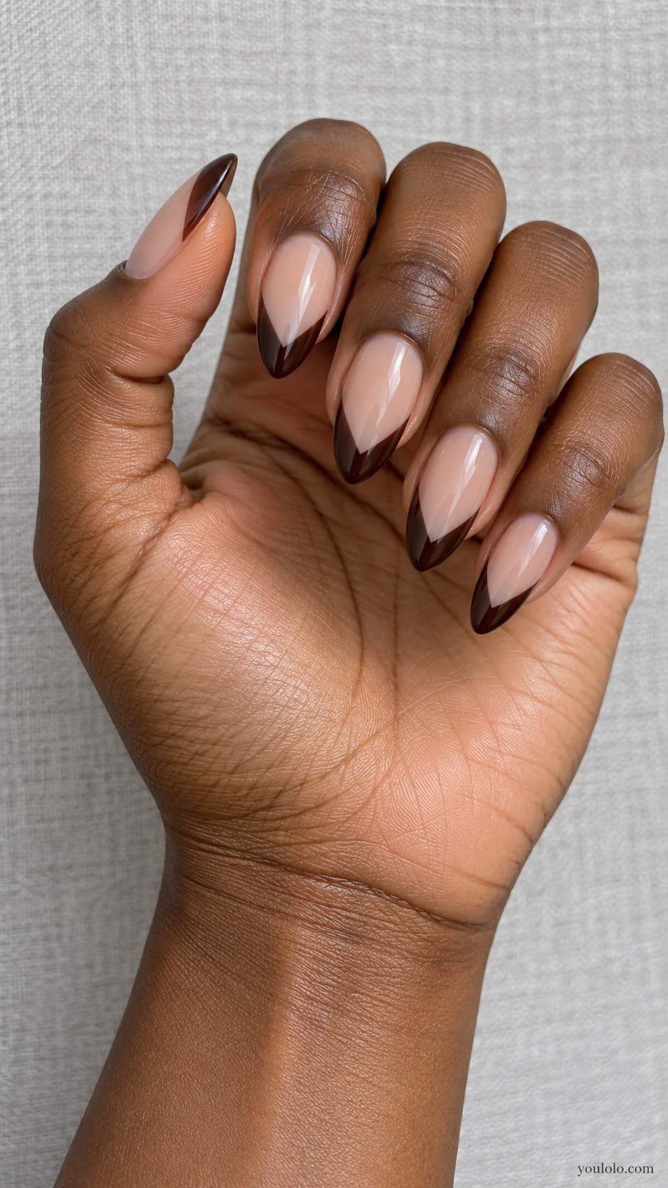 Chocolate Deep V French — medium almond sheer beige nails dramatic dark chocolate V shaped tips