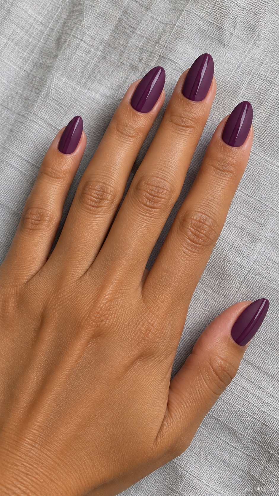 Medium almond matte mulberry purple nails one narrow glossy same purple lengthwise stripe each nail