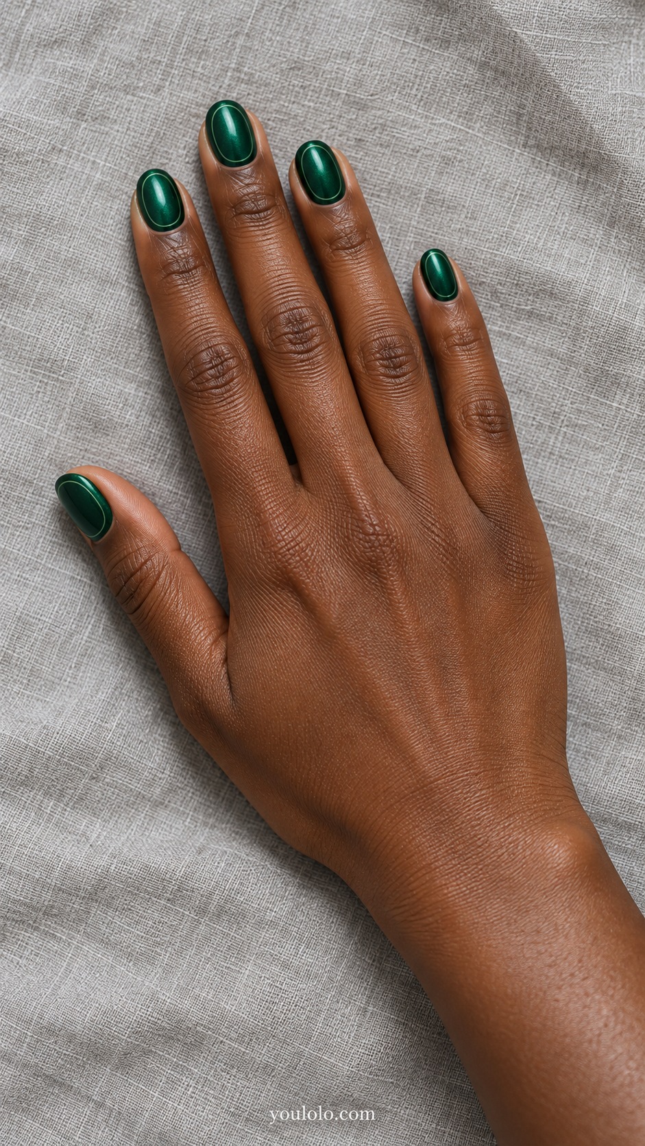 Short oval deep emerald pearl nails fine lighter green oval outline just inside nail perimeter, no gems