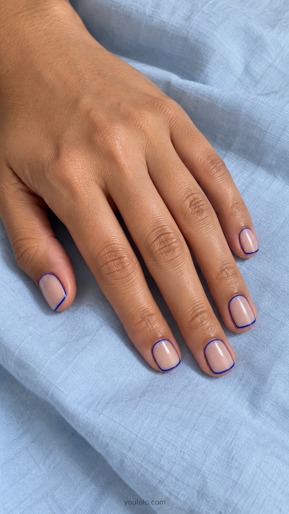 Short Square Nail Designs: Cobalt Edge Frame manicure on a naturally posed hand
