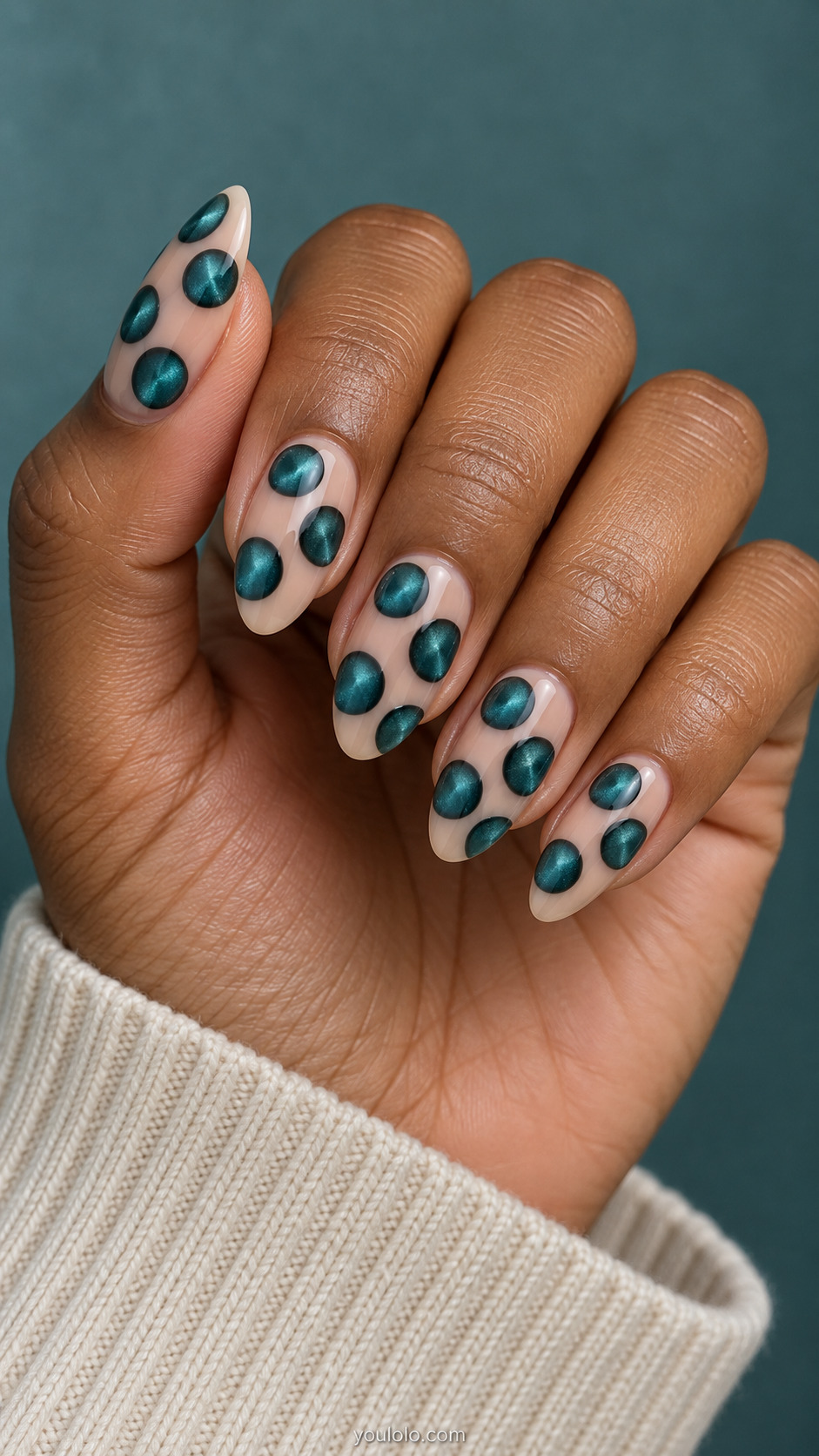 Magnetic Dots With Fine Ring Outlines manicure on medium almond.