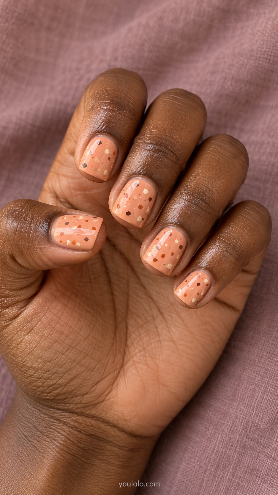 Short Square Nail Designs: Peach Terrazzo manicure on a naturally posed hand