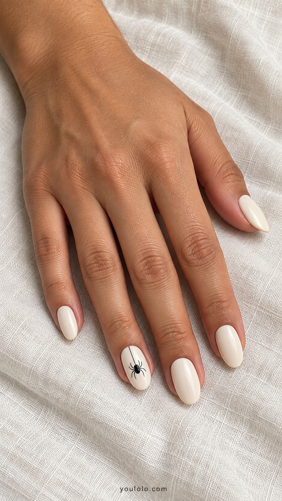 October Nails — Ivory with a Tiny Black Spider