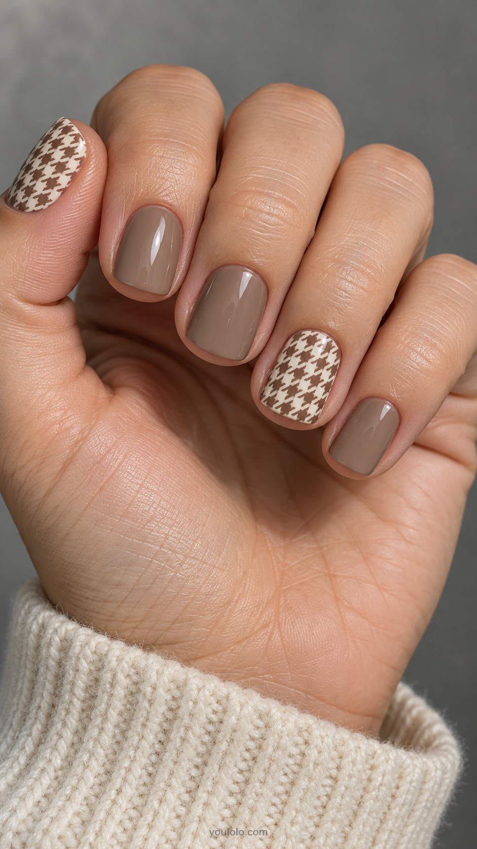 Short square nails: taupe nails, ring and thumb ivory base with tiny neat cocoa houndstooth flat printed pattern, others plain taupe.