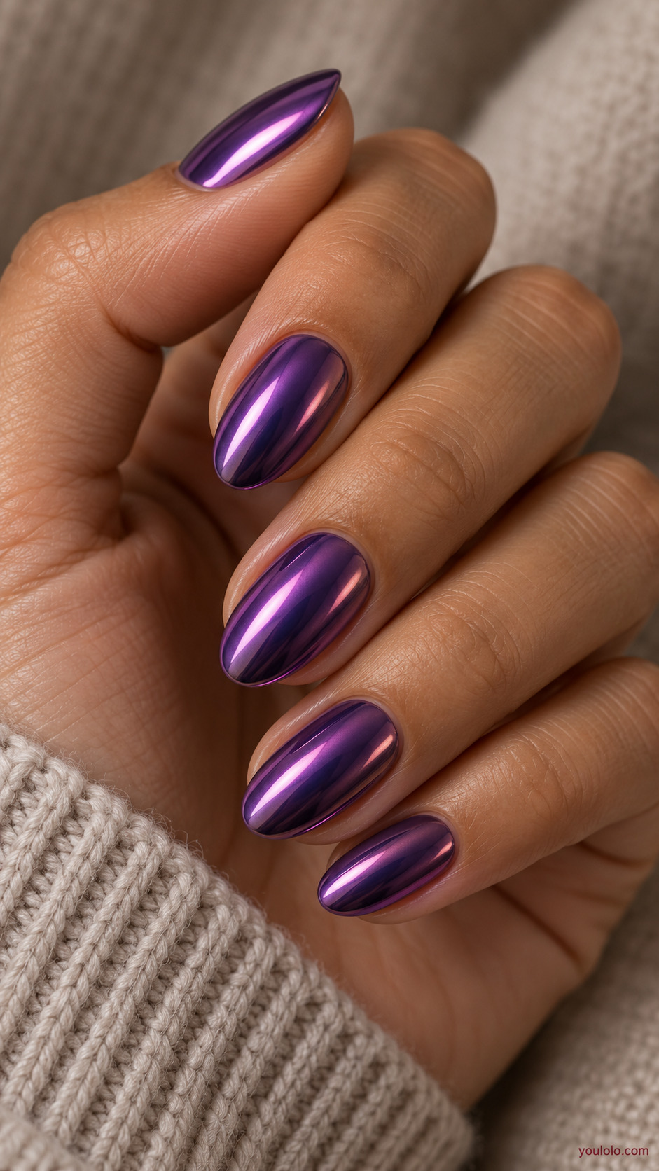 Violet Chrome with a Pink Shift on a naturally gathered feminine hand showing the nail finish