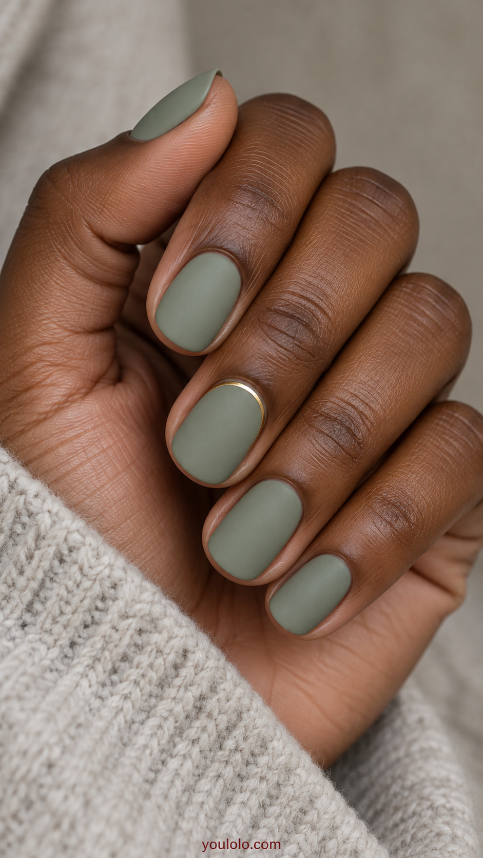 Soft Sage with One Gold Cuticle Arc on a softly gathered feminine hand with a matte green manicure