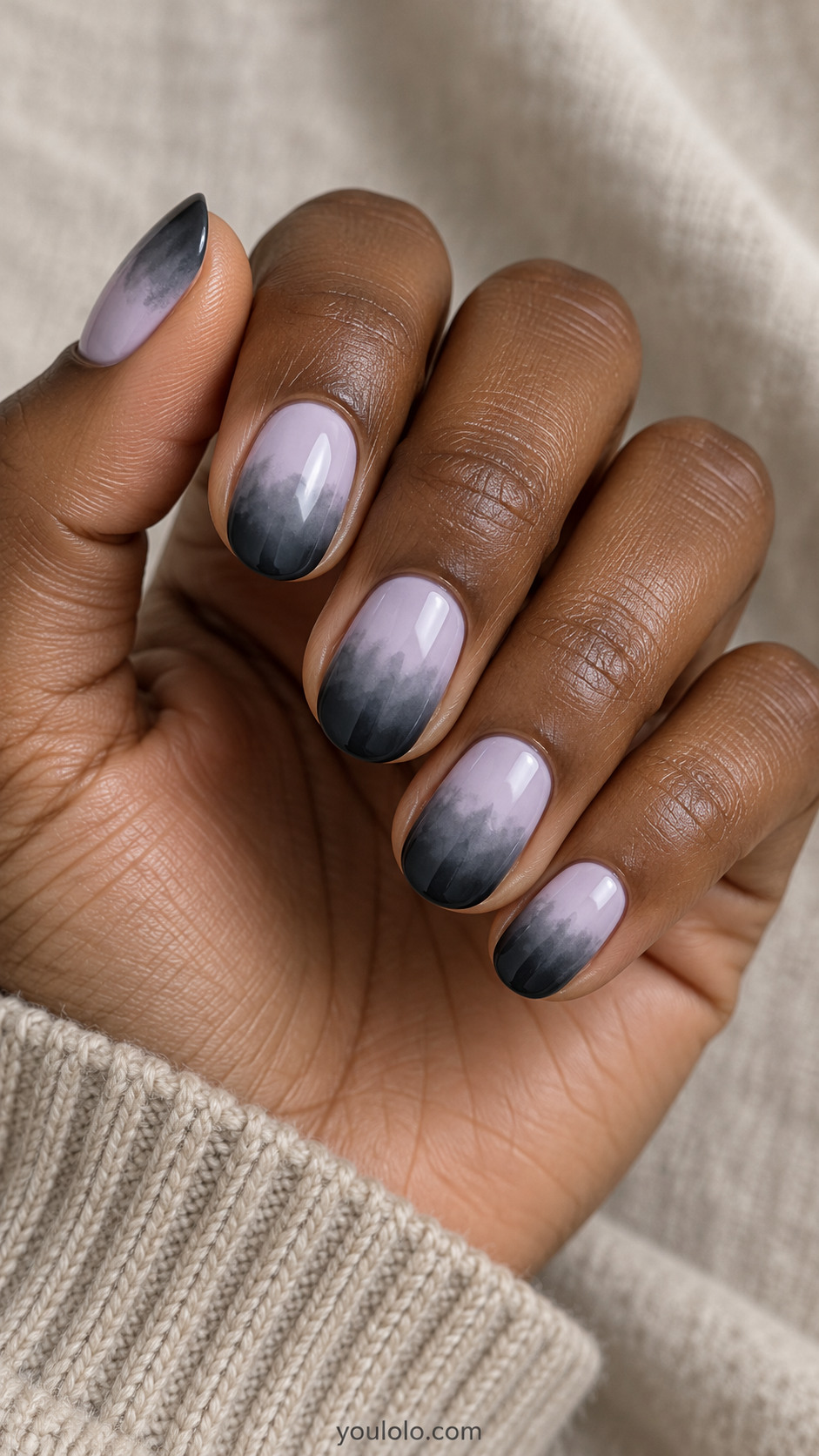 Short lavender nails fading into soft charcoal tips