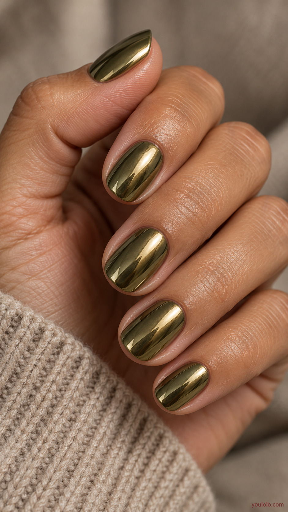 Olive-Gold Chrome Nails on a naturally gathered feminine hand showing the nail finish
