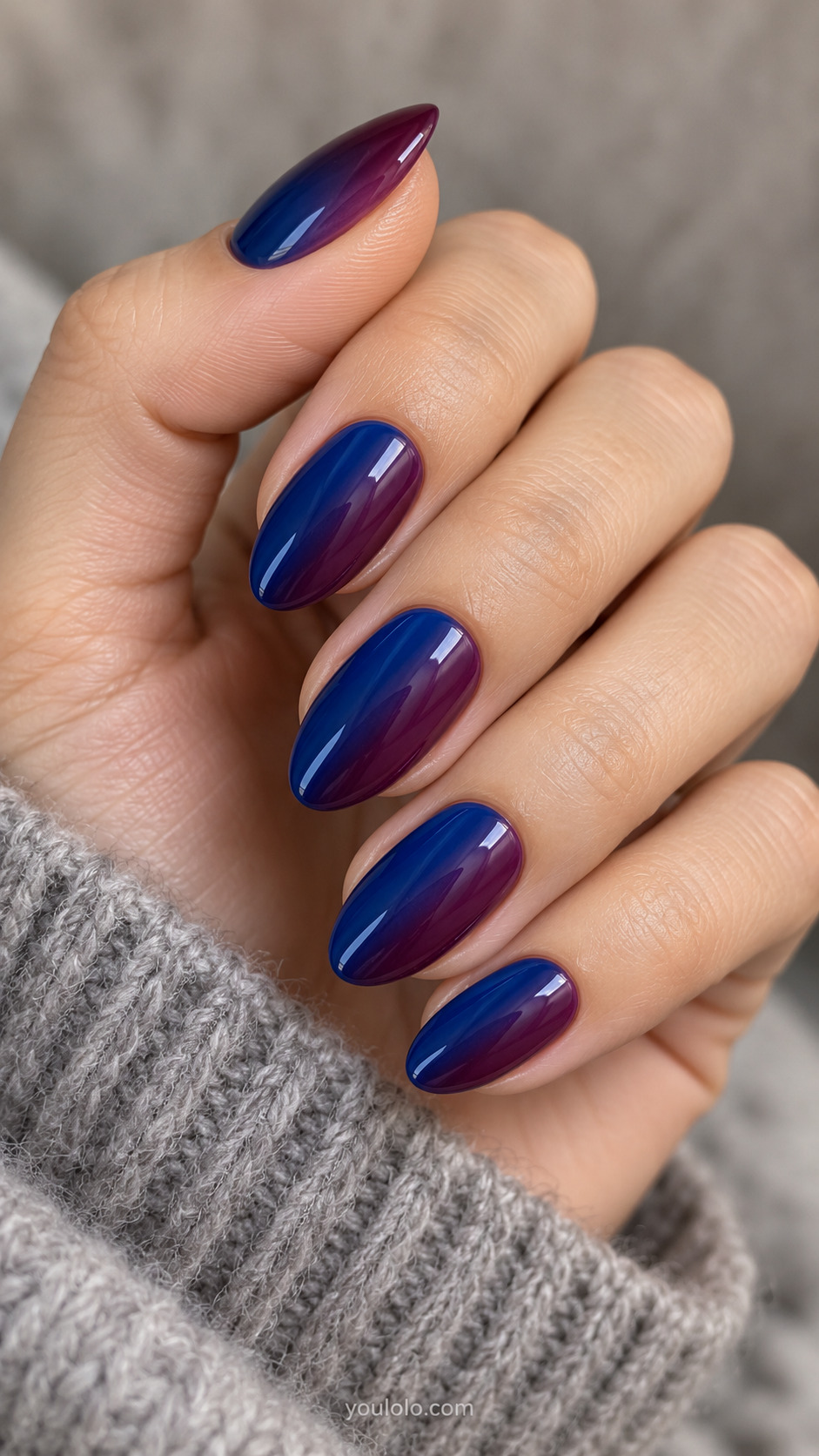 Sapphire and Plum Side Ombre on a softly gathered feminine hand with detailed sapphire blue manicure