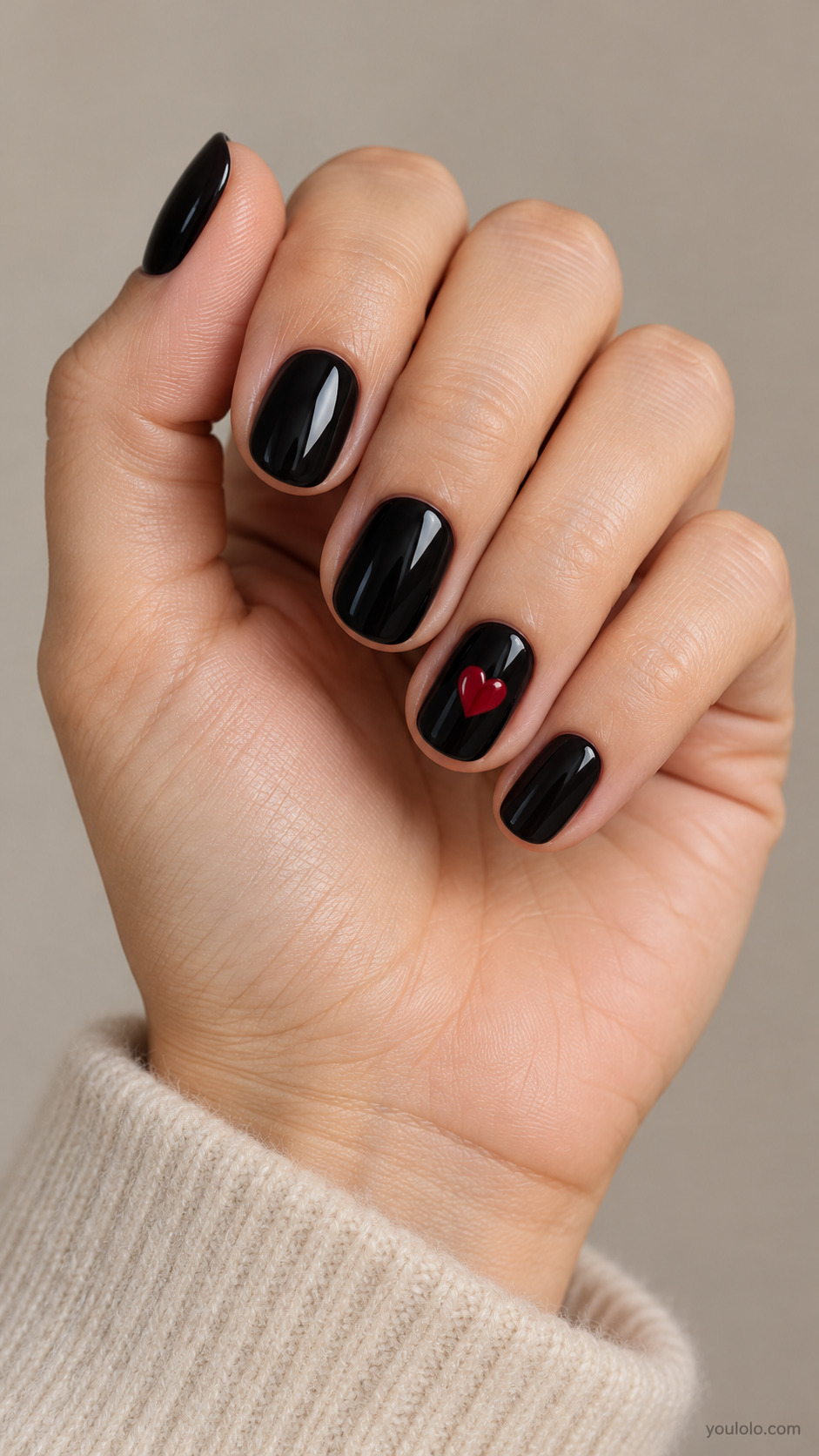 Short black nails with one red heart accent