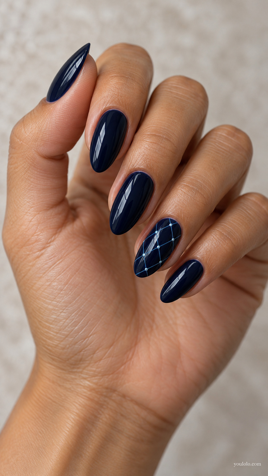 Fine Midnight Lace Mesh on a naturally posed hand, showing dark blue polish and detailed nail art