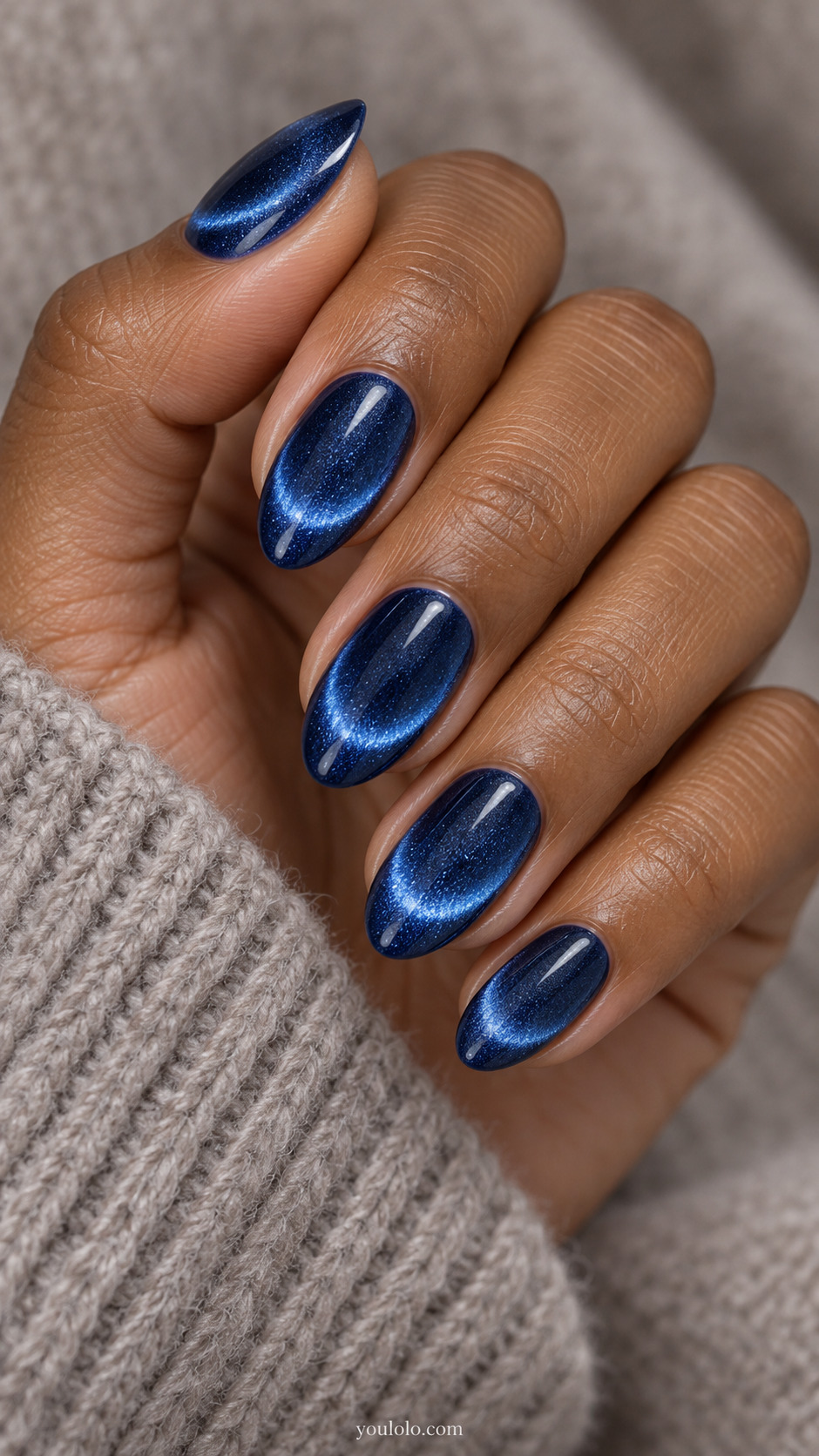 Sapphire Blue Velvet French Illusion on a softly gathered feminine hand with detailed sapphire blue manicure