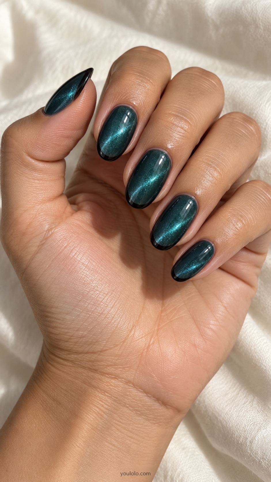 Teal with an Ink-Black Edge cat eye nails — Medium oval deep teal magnetic nails with ultra thin black French edge.