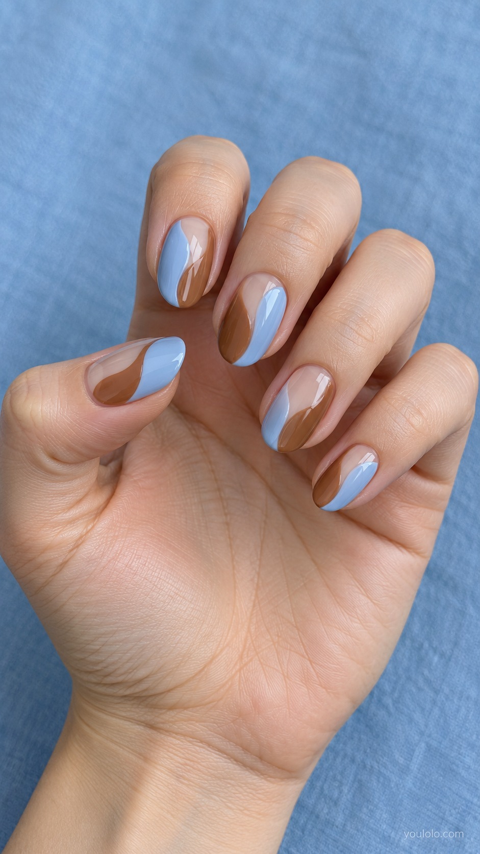 Blue and Toffee Wavy Blocks — medium oval pale blue and toffee brown opposing curved color blocks with small nude center gap