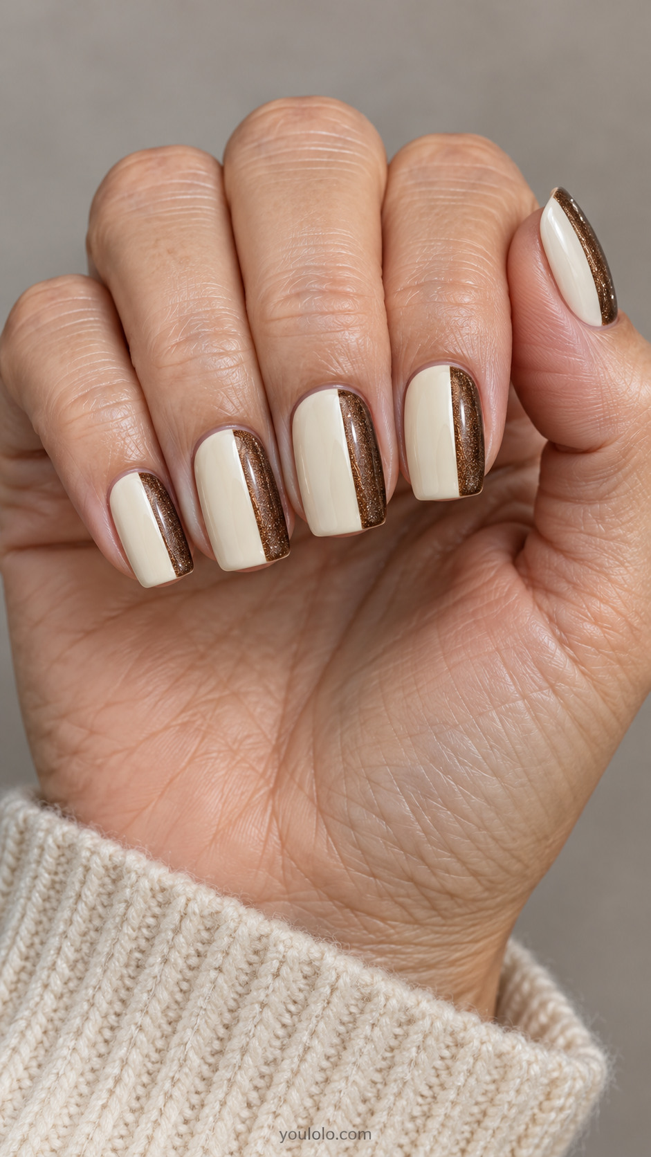 Medium square nails: opaque cream nails with narrow vertical brown magnetic velvet side panel occupying one third on every nail, clean straight division.