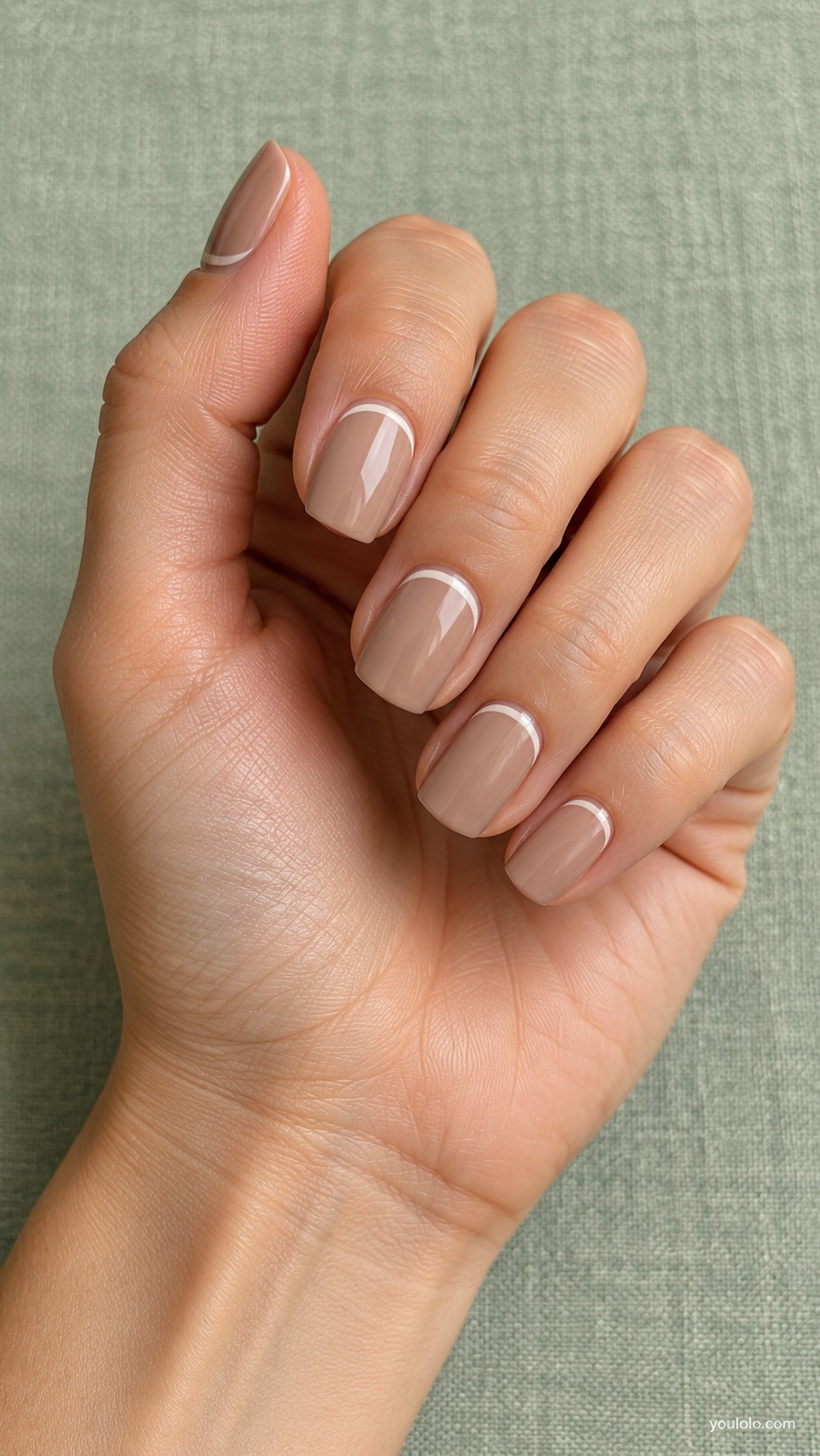 Cappuccino Reverse French — short squoval cappuccino cream nails thin ivory reverse French arc at cuticle