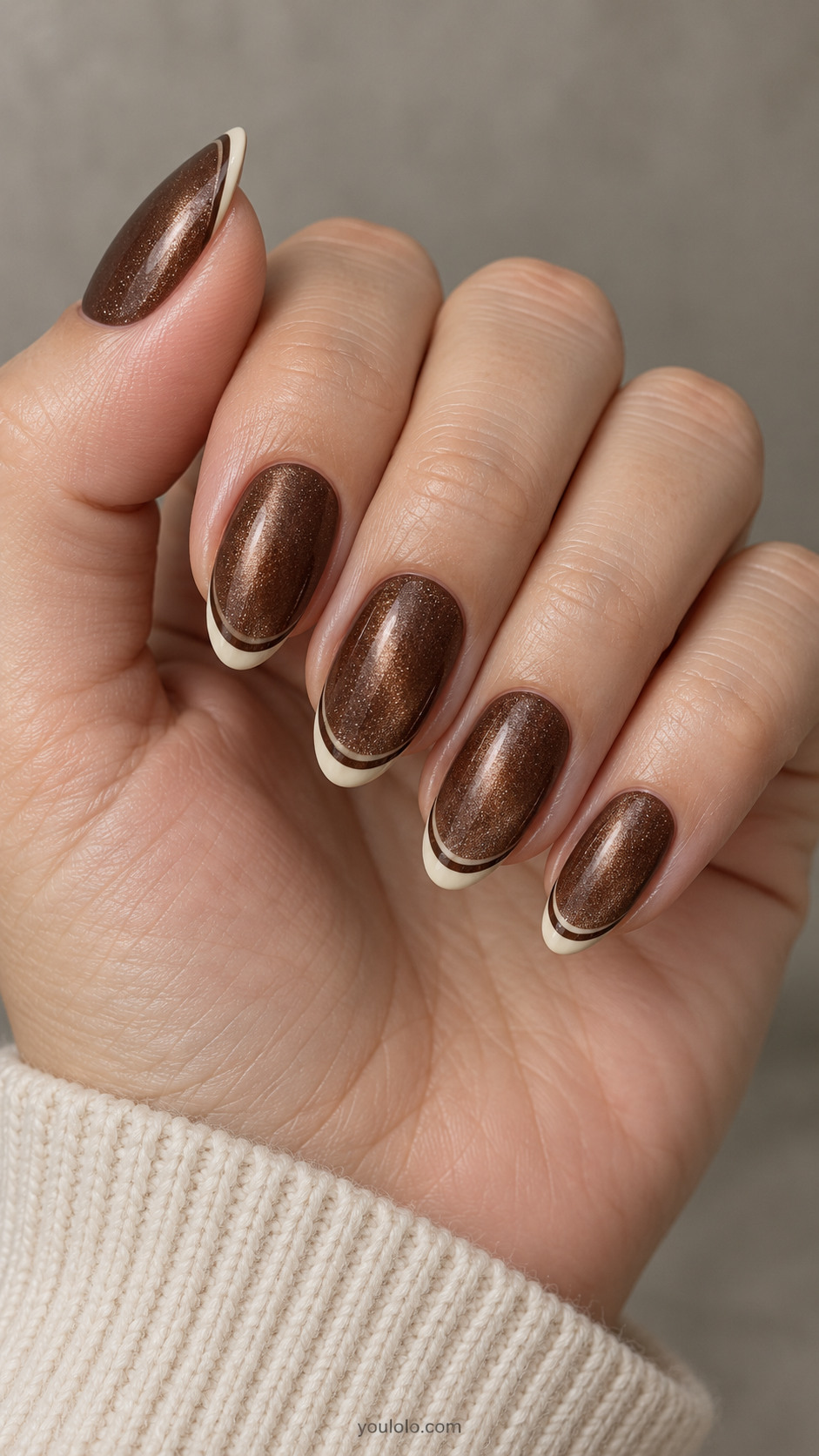 Almond brown magnetic nails with double cream French curves separated by a narrow brown gap.