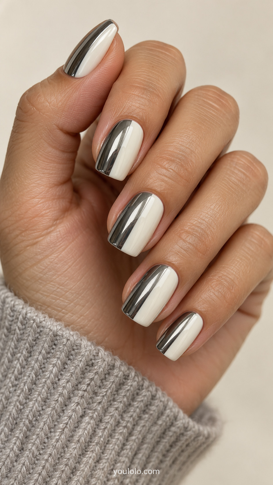 Soft square nails divided lengthwise into gunmetal mirror chrome and creamy ivory.