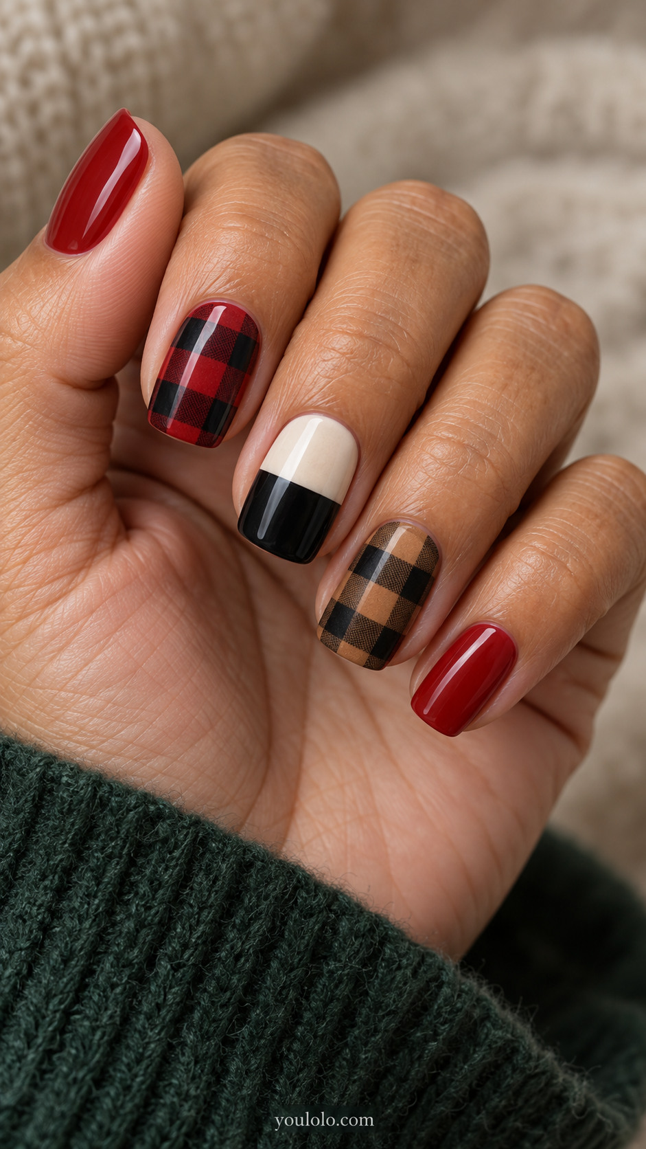 Mixed red and camel buffalo checks with a cream-and-black color-blocked nail