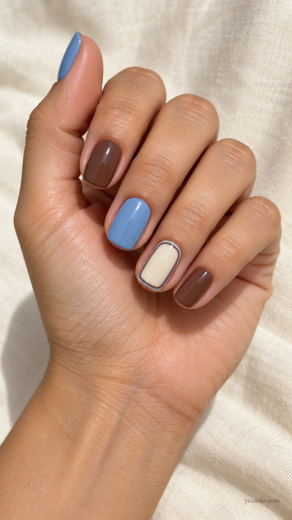 Sky and Cocoa Border Accent — short squoval alternating sky blue cocoa nails ring nail ivory base with blue and brown thin border frame