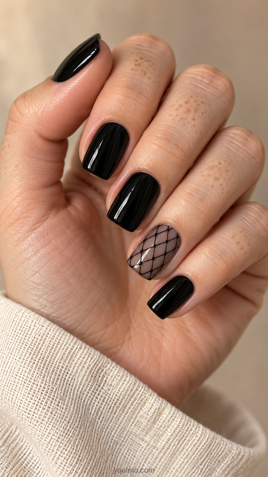 Black square nails with one sheer diamond mesh accent