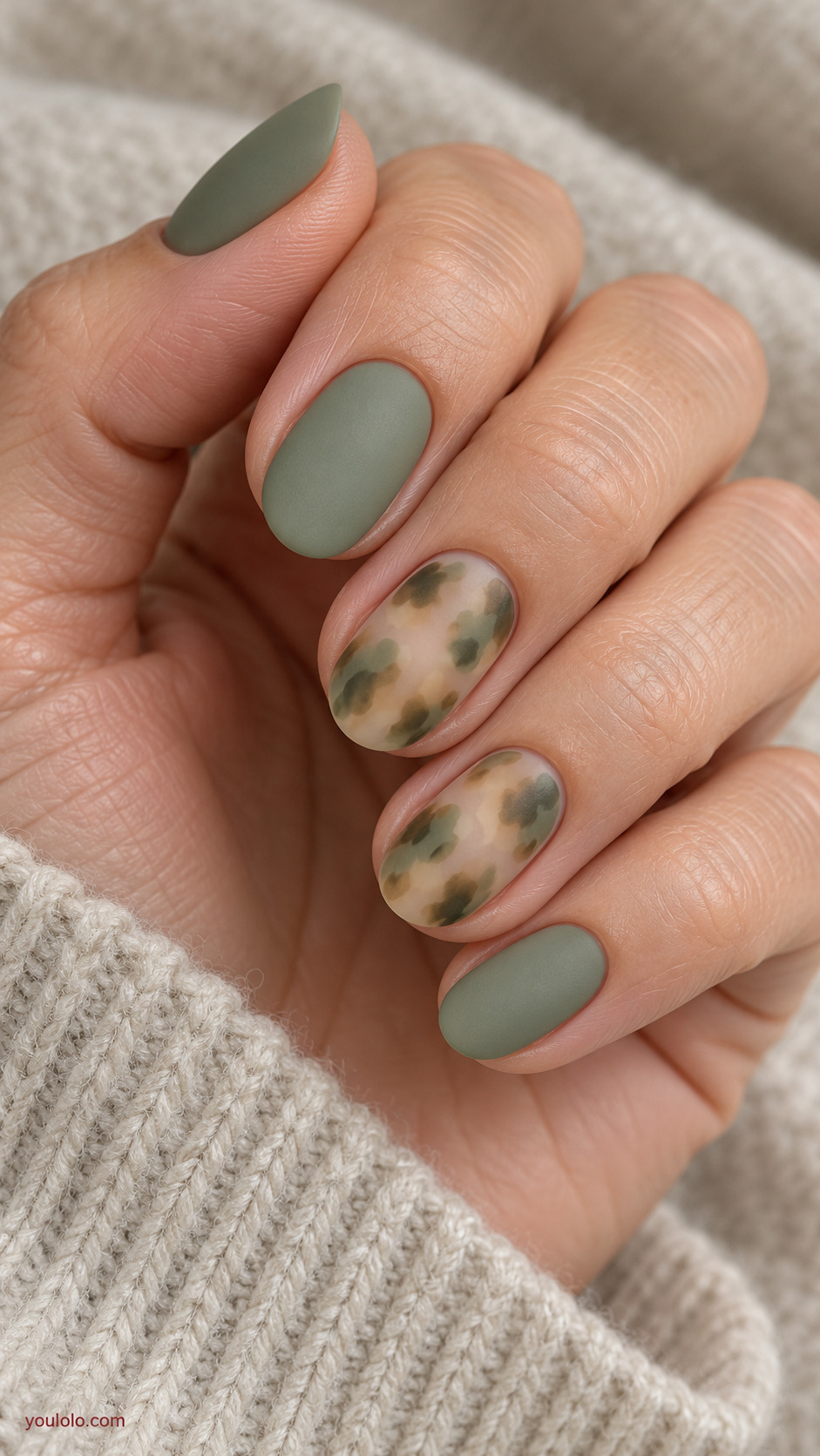 Matte Sage Tortoiseshell Accent on a softly gathered feminine hand with a matte green manicure