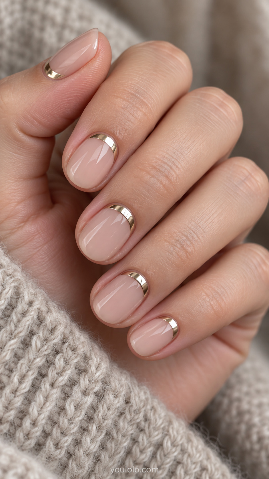 Champagne Chrome Reverse French on a naturally gathered feminine hand showing the nail finish