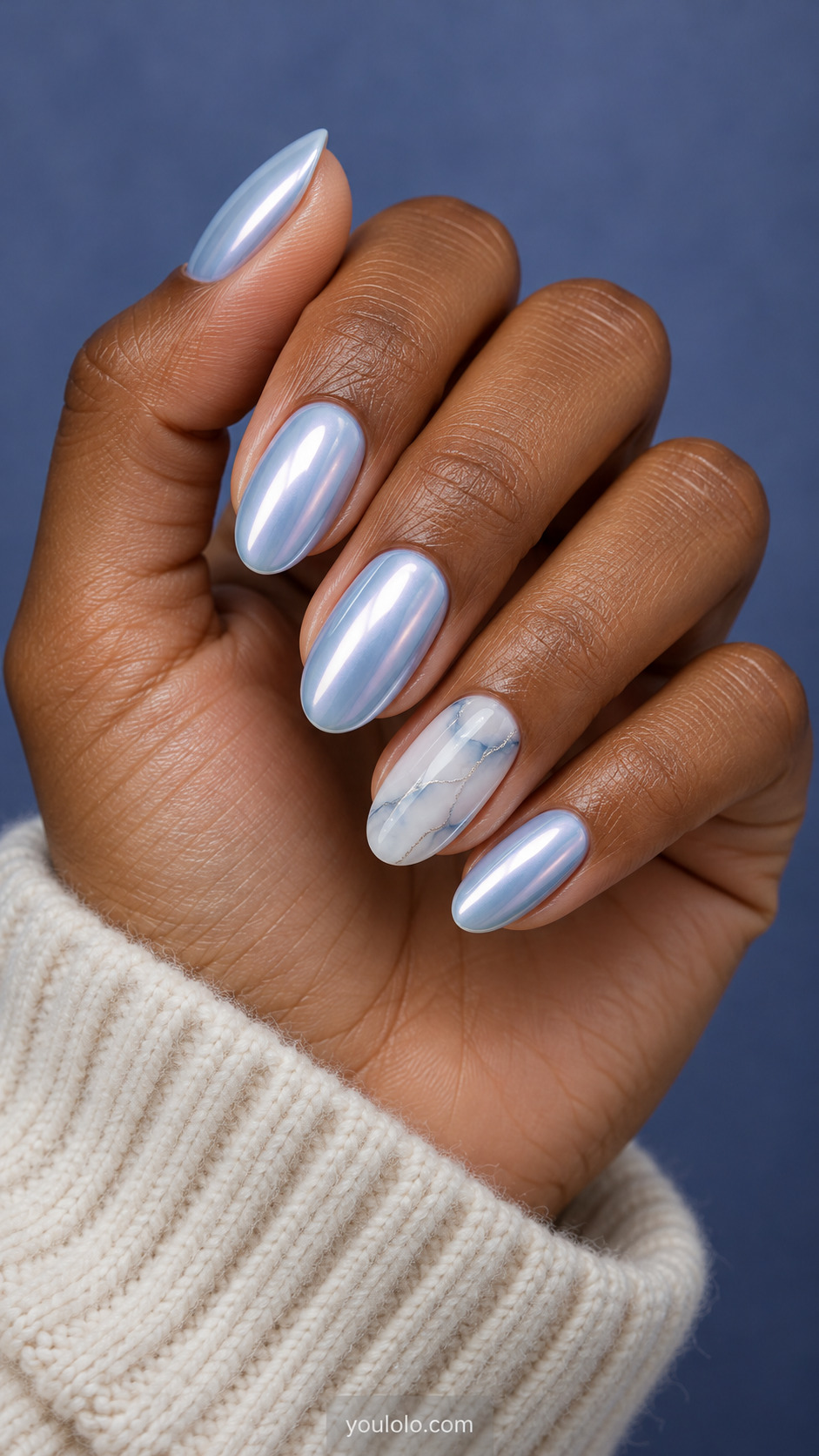 Pale blue pearl chrome ovals with one translucent glacier-marble accent and fine platinum veins.