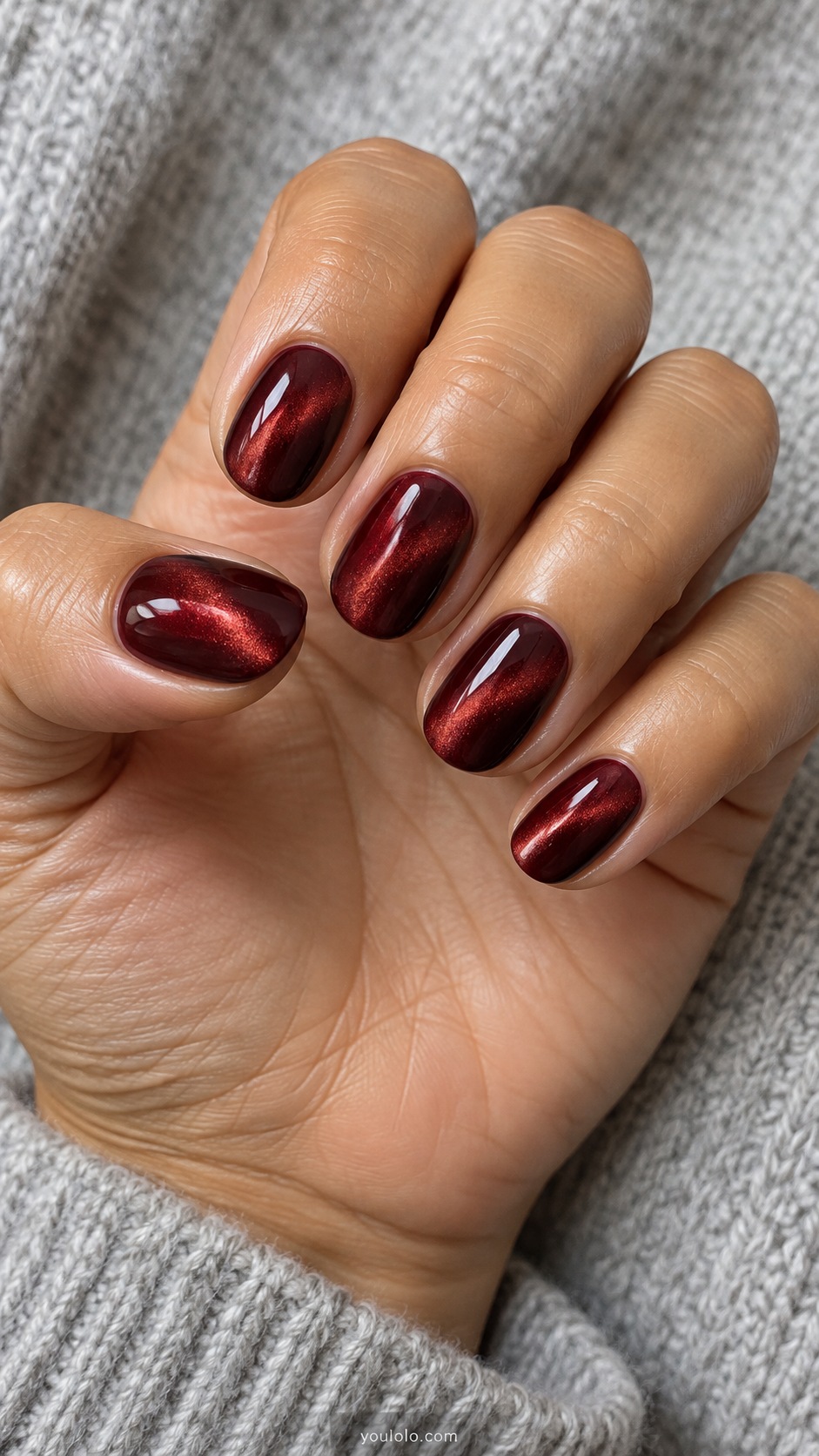 Burgundy Velvet on Short Ovals cat eye nails — Short oval deep wine burgundy nails with broad ruby velvet magnetic glow.