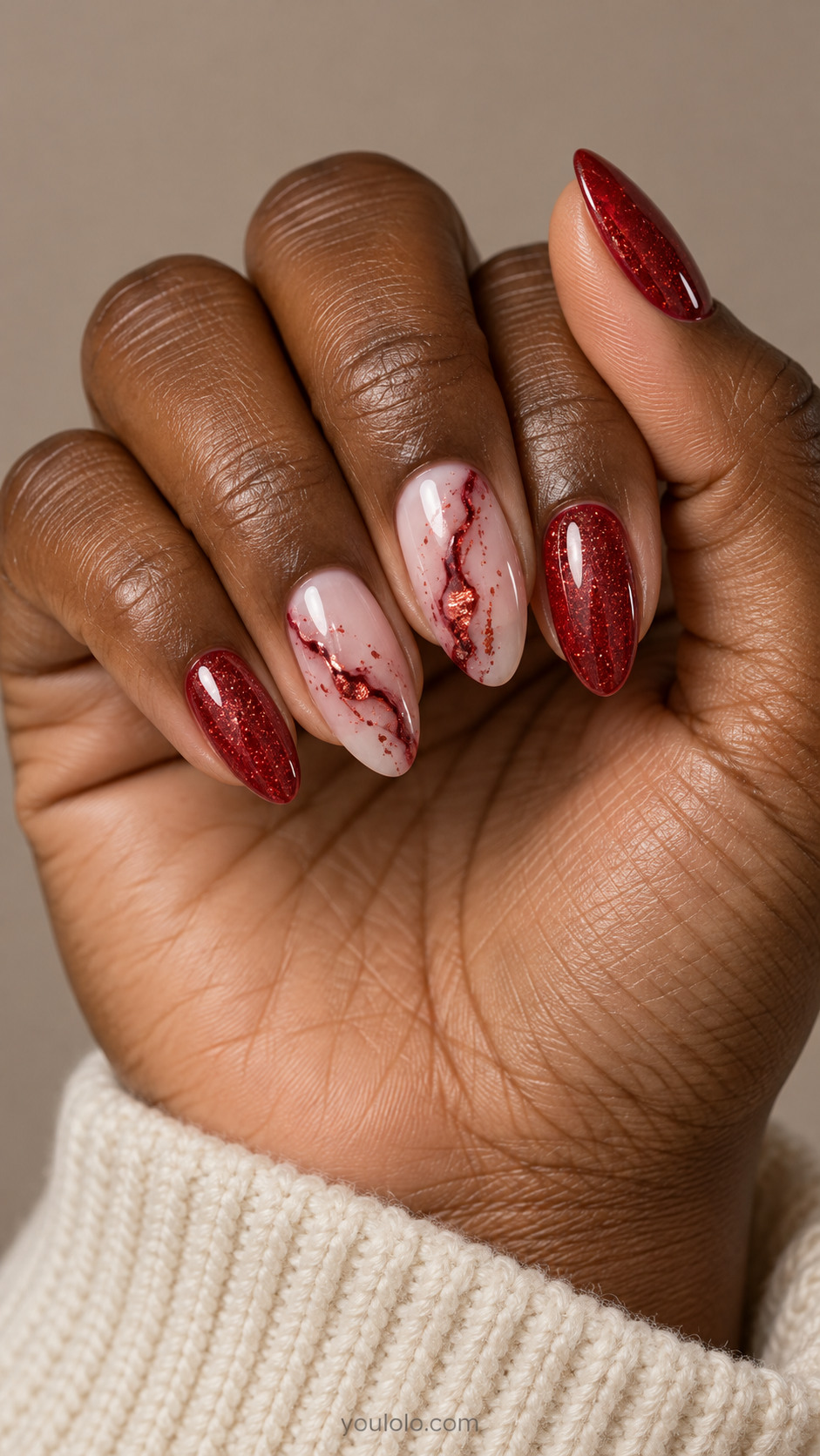 Ruby jelly and milky pink almond nails with flake marble accents