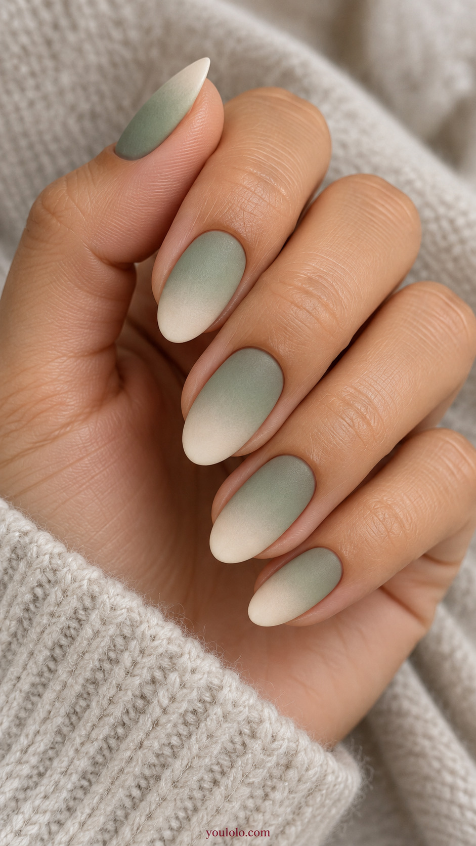 Soft Sage to Cream Ombre on a softly gathered feminine hand with a matte green manicure