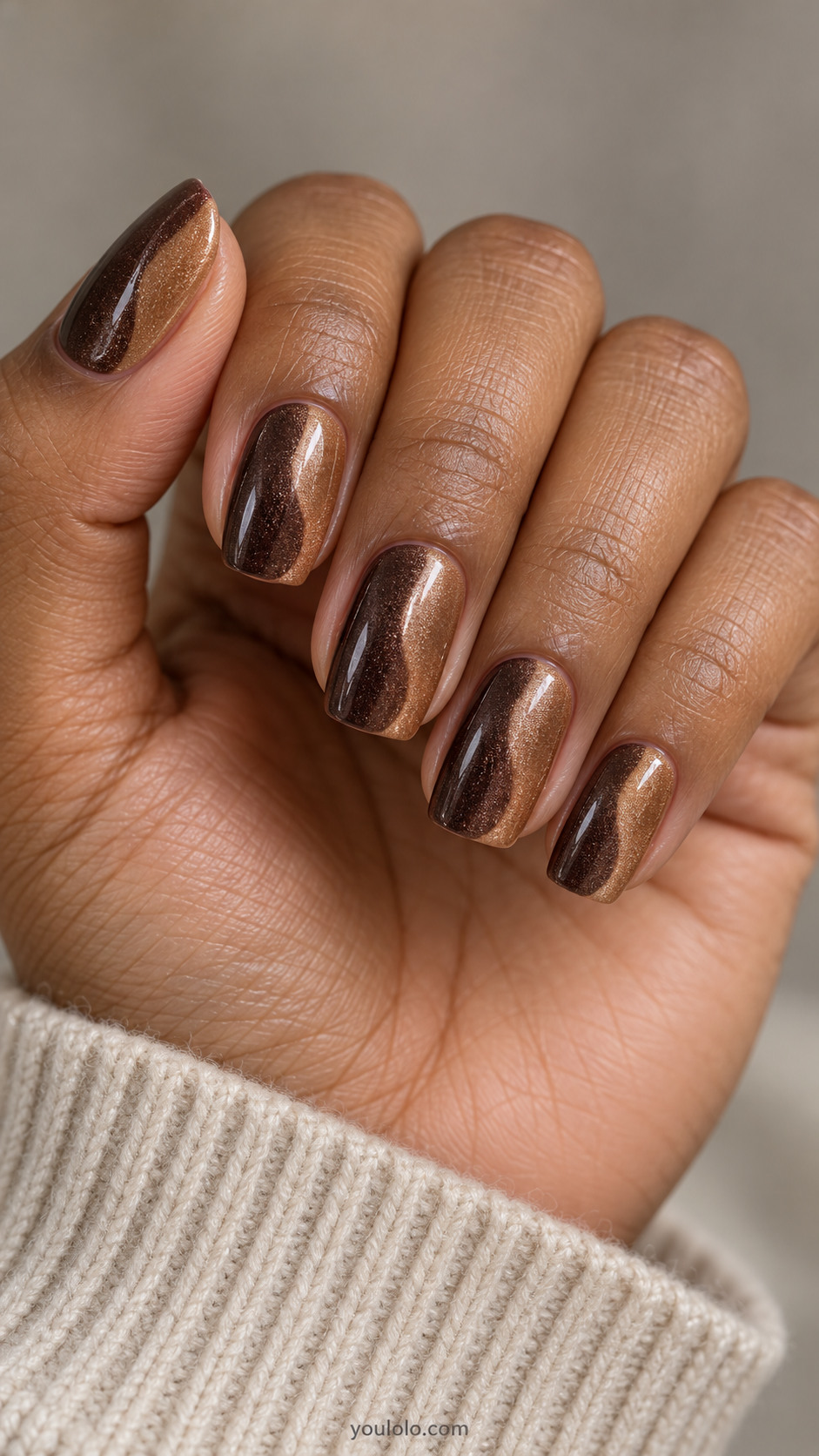 Medium squoval nails: every nail vertically divided into espresso magnetic velvet and caramel magnetic velvet halves with softly curved clean border, no painted outline.